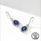 Blue Sapphire Drop Earrings in 925 Sterling Silver with Oval Halo