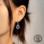 Blue Sapphire Drop Earrings in 925 Sterling Silver with Oval Halo