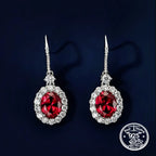 Ruby Drop Earrings in 925 Sterling Silver with Oval Halo